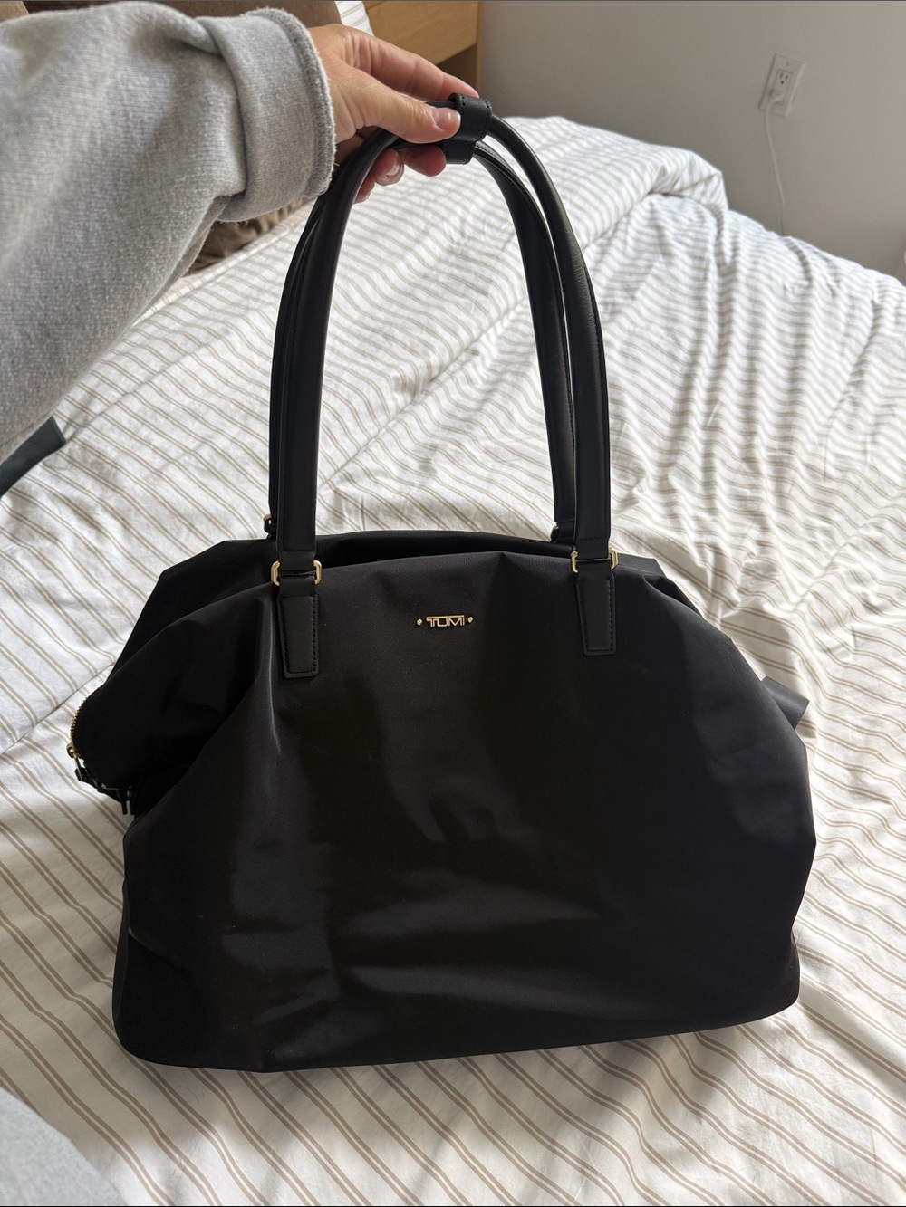 Tumi Black Weekender with Gold Accents